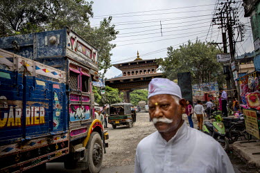 Trucks and people cross through the Buthan gate which marks the border point between India and Bhutan and is one of the main smuggling routes for tiger parts trafficked between India and China.