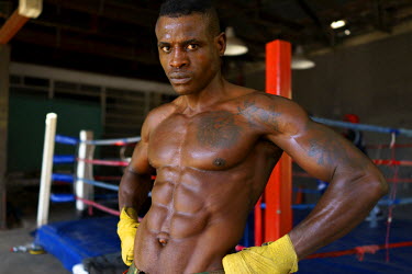 Yomi Shokunbi, a Nigerian living in South Africa, training at George Khosi's Hillbrow Boxing Club. Currently a model and fitness trainer, Yomi hopes to qualify for his boxing license in a few weeks ti...