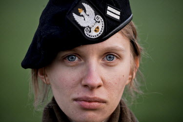 Maja, a young member of Strzelec (The Shooter), a paramilitary association, training on the playing field of a local school. The weekend saw a gathering of several paramilitary groups from the region...