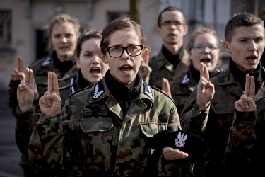 Young members of Strzelec (The Shooter), a paramilitary association, taking an oath in the yard of the local school. The weekend saw a gathering of several paramilitary groups from the region for a tr...