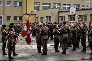 Young members of Strzelec (The Shooter), a paramilitary association, taking an oath in the yard of the local school. The weekend saw a gathering of several paramilitary groups from the region for a tr...