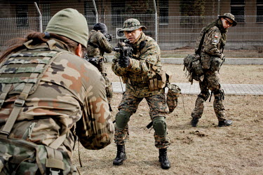 Cadets from the paramilitary organisation FIA (FIDELES ET INSTRUCTI ARMIS) during training (using replica weapons) at the Polish army base in Warsaw. FIA's recruits consist of ordinary civilians from...