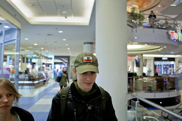 Maja, 20, a member of Strzelec (The Shooter), a paramilitary association, shops at Blue City mall with her boyfriend Darek. The symbol on his cap is the insignia of the WW2 Polish Home Army (Polish Un...