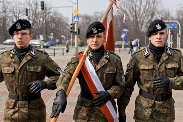 Young members of Strzelec (The Shooter), a paramilitary association, parade with the Polish flag at an oath taking ceremony. Since the start of war in Ukraine, membership of paramilitary associations...