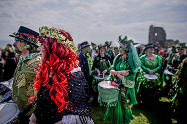 People gather for a Jack in the Green festival. The festival is part of a recent revival of an older custom where people would wear frameworks covering much of their bodies which were decked out in fo...