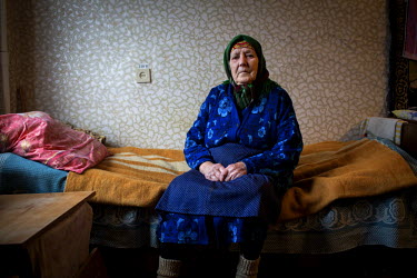 Alexandra Leonova, 91, pictured in her temporary accommodation at a collective shelter for people displaced by the conflict. Alexandra fled her home in Nikishino on September 28, 2014, after her house...