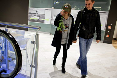 Maja, 20, a member of Strzelec (The Shooter), a paramilitary association, shops at Blue City mall with her boyfriend Darek. The symbol on his cap is the insignia of the WW2 Polish Home Army (Polish Un...