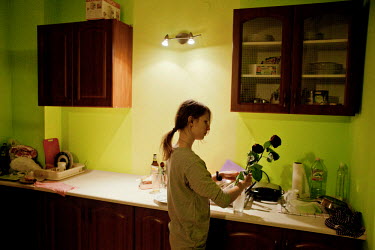 Student Maja, 20, in her apartment. SHe and her flat mate are both members of Strzelec (The Shooter), a paramilitary association which, since the start of the war in Ukraine, have become increasingly...