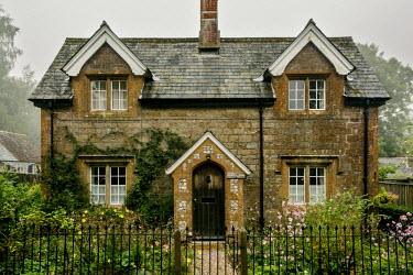 A stone built house in the village of Evershot. The village featured in several works by Thomas Hardy who renamed Evershead.