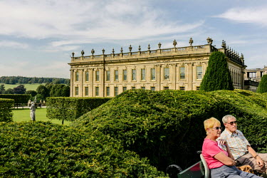 Tourists at Chatsworth House, a stately home in Derbyshire. It is the seat of the Duke of Devonshire and has been home to the Cavendish family since 1549.
