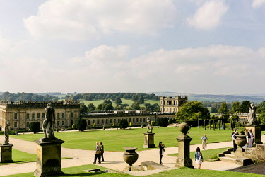 Tourists in the grounds of Chatsworth House, a stately home in Derbyshire. It is the seat of the Duke of Devonshire and has been home to the Cavendish family since 1549.