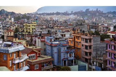 A view of a dense warren of streets in Kathmandu, the capital of Nepal. Over the past few years, Kathmandu has undergone a period of rapid urbanization, however throughout this process it has remained...