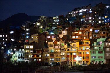 The lights of Kirtipur, an ancient city swallowed up by the metropolis of Kathmandu, illuminate the hillside into which it was built. Several decades ago there were only traditional thatch and brick h...