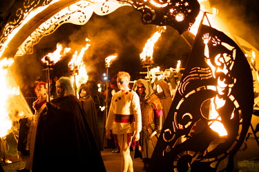 Revellers wearing fancy dress and holding torches take part in the Beltane Fire Festival on Carlton Hill in Edinburgh.  People gather in front of the National Monument on Carlton Hill in Edinburgh to...