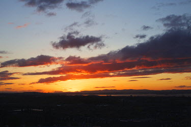 The sun sets over Edinburgh as seen from Carlton Hill, the setting for the annual Beltane Fire Festival. The Beltane Festival is an annual event when winter is purged by fire. From sunset on 30 April...