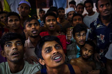 Detained Rohingya boat people, who were released from incarceration in camps run by people-traffickers, plea for food and help at the Songkhla Immigration Detention Centre. Some Rohingya, who are pers...