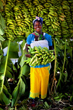 Ruthy Myabepo a banana grower, one of a number of women from the rural village of Chiawa who have been supported by Oxfam. The Charity have invested in solar fencing, irrigation, and training; empower...