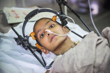 Gita Biko, 14, sustained a spinal injury when a brick wall collapsed on her during the earthquake. She was transferred from her home village in Baki District to Bir Hospital in Kathmandu on helicopter...