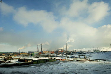 A view of the industrial complexes at Norilsk.  Greater Norilsk consists of three settlements: Norilsk, Talnakh and Kayerkan, all within a radius of 30 kms and connected by roads. According to a 2010...
