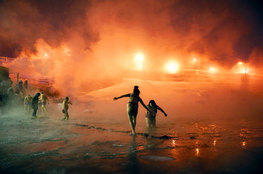 Norilsk residents enjoy a dip in an icy lake as part of the so-called 'Walrus' club. A popular past time is to take a dip in holes cut into the ice and then retire to a 'banya' (or sauna) which is hea...