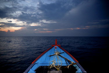 An Indonesian fishing boat sails in home waters north of Natuna Island in the South China Sea.