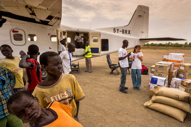 An Medecins Sans Frontieres (MSF) plane delivers medical supplies at Leer airstrip.  In 2014, the MSF hospital in Leer – which has served the community for 27 years – was burned and looted when th...