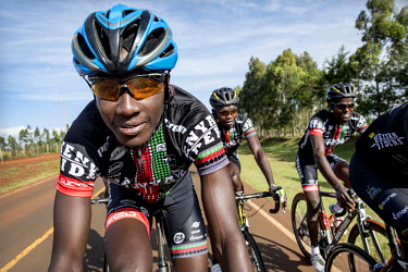 The Kenyan Riders, a Kenyan cycling team, train along the road between Eldoret and Iten, a small town in the highlands on the edge of the Great Rift Valley at an altitude of 2400 metres, a perfect loc...