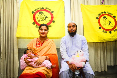 Parents and their child at Dhaka Shishu (Children's) Hospital at the launch of the Expanded Program on Immunisation (EPI) where the pneumococcal vaccine (PCV), which protects against one of the leadin...