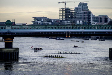 Members of the Oxford and Cambridge women's rowing teams irace each other on the River Thames. The squads are preparing for the 2015 Oxford vs Cambridge Universities Boat Race which for the first time...
