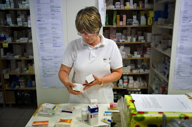 A volunteer at the pharmacy of the Metropolitan Community Clinic.