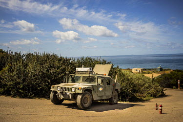 An autonomous Humvee is parked along a testing route at Spawar, or Space and Naval Warfare Systems Command, a research and operations arm of the Navy. The Unmanned Systems Group at Spawar is developin...