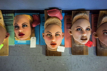 The heads of sex dolls lie on the floor inside the San Marcos headquarters of Real Dolls. The Real Doll is a high-end sex doll created by Matt McMullen. Mr McMullen is now trying to combine different...