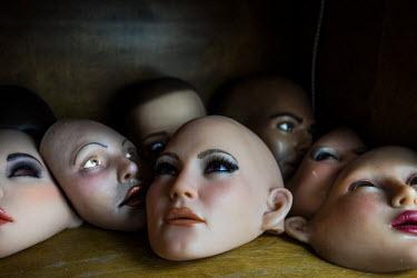 The heads of sex dolls lie on a shelf inside the San Marcos headquarters of Real Dolls. The Real Doll is a high-end sex doll created by Matt McMullen. Mr McMullen is now trying to combine different te...