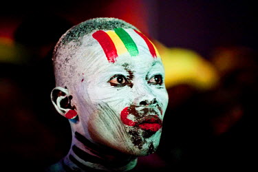 A supporter at a live broadcast in Accra watches anxiously during the 2010 FIFA World Cup match that saw Ghana beaten controversially by Uruguay on 2 July 2010.