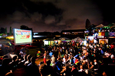 A crowd gathered at Epo's, a popular nightspot in Ghana's capital Accra, to watch a live broadcast of the FIFA World Cup match between Ghana and Germany on 23 June 2010.