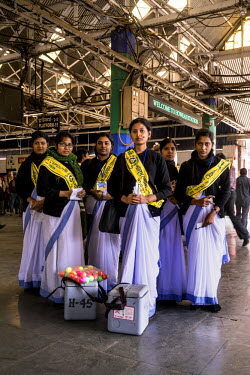 Nursing students from the Howrah District Hospital, with their medicines and wearing Polio Day sashes, at the Howrah Station. The students vaccinate children transiting through the train station, whic...