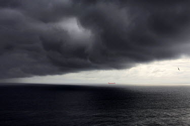 A tanker plies the Sumburgh channel, one of hundreds travelling to and from from the Atlantic deep-water frontier and distant oil terminals.