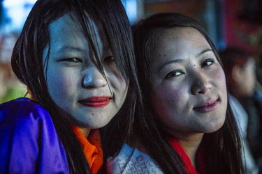 Samara (19, left) and Dichen (19, right) dancers in 'Tashi Tagay drayang'. Female dancers receive 40% of what clients pay for the dance and can make from 200 to 400 US Dollars a month. Drayangs are cl...