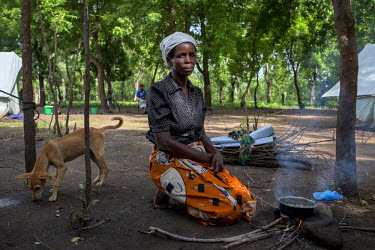 Lucia White, 45, cooks dried fish in Khulubvi Camp which was set up following devasting floods in early 2015 that affected half of Malawi and forced around 250,000 people from their homes.