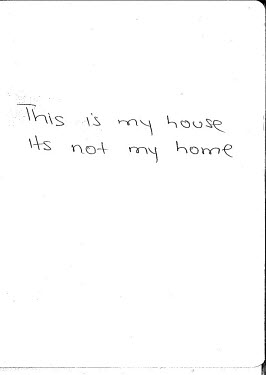 A note written by Dudu: ^This is my house, its not my home.^ Dudu grew up in Soweto and has recently moved to Observatory. Observatory is a district which is sandwiched between the poor Central Busine...