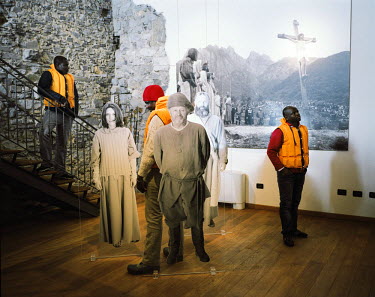 African migrants visiting the Casa Museo in Cerveno, a museum on the life of people of the Camonica Valley 100 years ago.