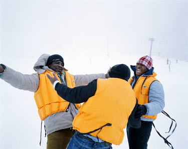 Happy, Ibrahim and Henry, three Nigerian migrants, discover the Monte Campione ski resort during a snow storm, four months after having left the area they have returned only to get their first encount...