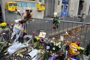 An impromptu memorial of flowers and candles near the Bataclan club where, the evening before, 89 people died when gunmen entered the venue during a concert and began to fire automatic weapons at the...