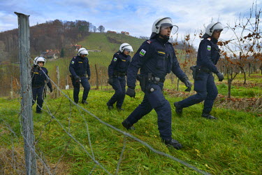Police deployed to try and stop a clash between of a pro-refugee leftist group of marchers and an opposing rightist anti-immigration group. A game of cat and mouse ensued through the steep vineyards o...