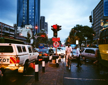 A traffic jam in the centre of Nairobi. The number of cars has risen sharply in the past 10 years, creating havoc this city made up of small streets. On rainy days it can take two hours to leave the c...