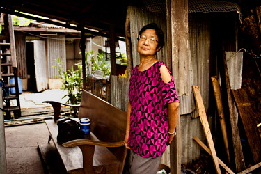 Chutima, 57, has a toilet and bathroom just outside her house in the slum district of Ding Dang. 'It's hard not to be scared of strangers at night but, so far, I have been safe. My main worry is with...
