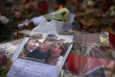 A photograph at one of the many impromptu memorial sites created by the public at the sites of the atrocities and in the Place de la Republique as Paris struggles to come to terms with the events of 1...