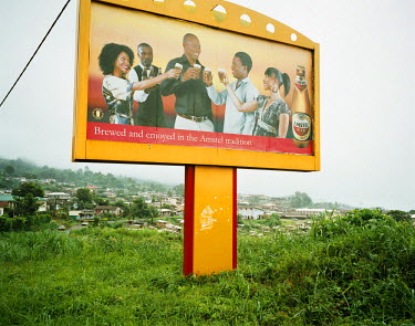 A billboard advertisement for Amstel beer depicting an asperational middle class lifestyle.