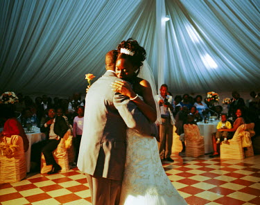 The bride and groom have the first dance at their wedding in downtown Maputo. At the event about 300 people were catered for in a marquee set up in a park. After the wedding and feast, which carried o...