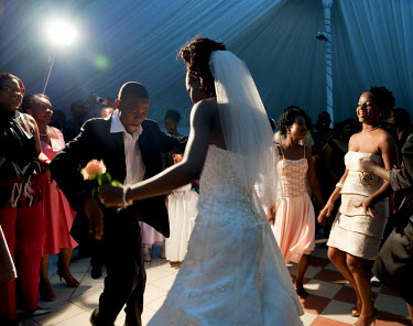 The bride and groom have the first dance at their wedding in downtown Maputo. At the event about 300 people were catered for in a marquee set up in a park. After the wedding and feast, which carried o...